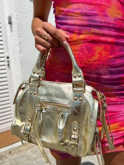 Bolso hebillas piel brillos dorado