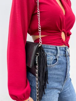 Bolso piel cadenas flecos negro