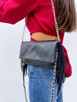 Bolso piel cadenas flecos negro