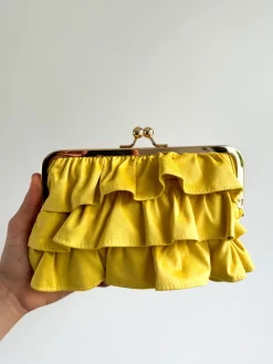 Clutch ante volantes amarillo