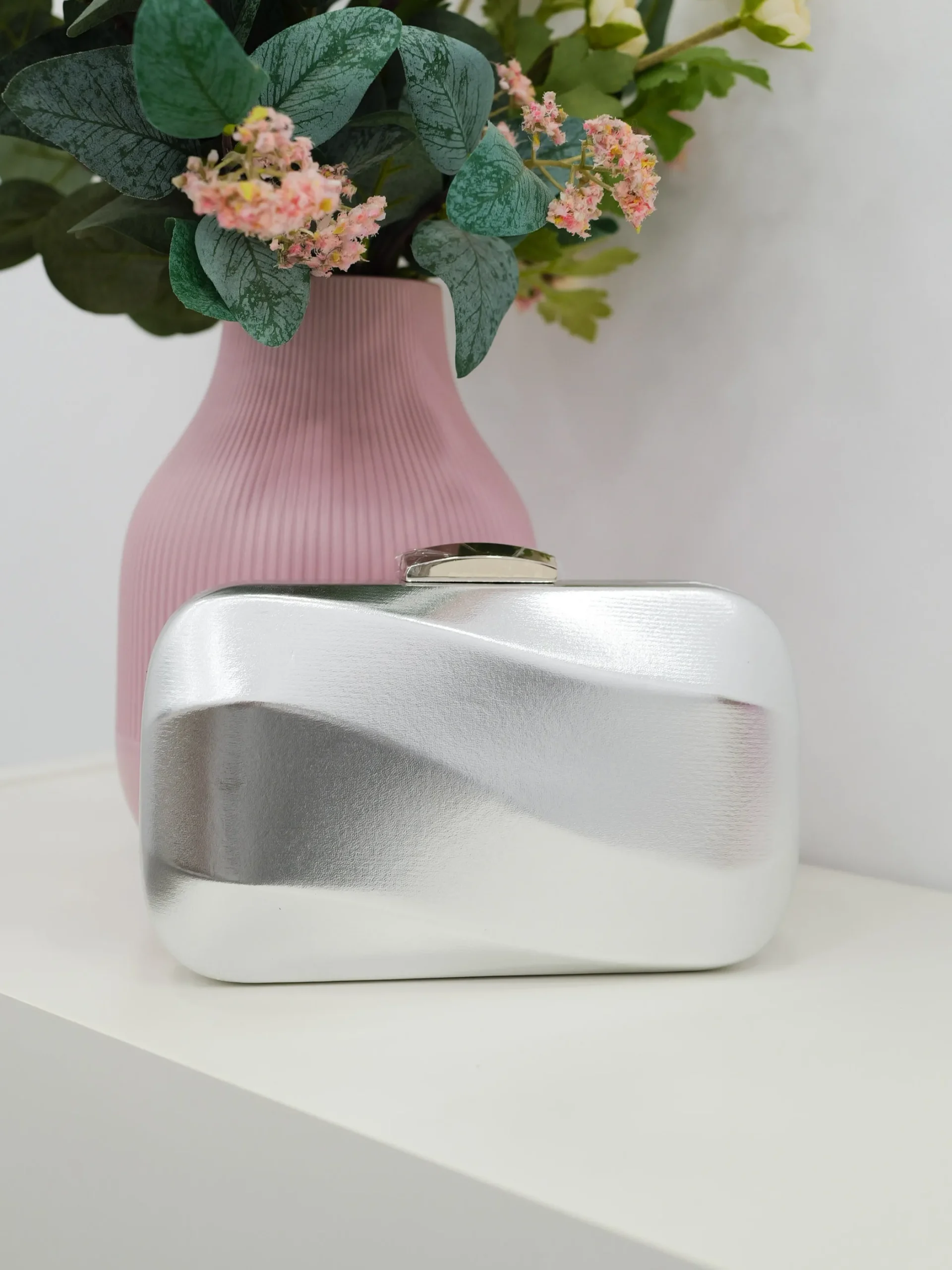 Clutch efecto ola plata