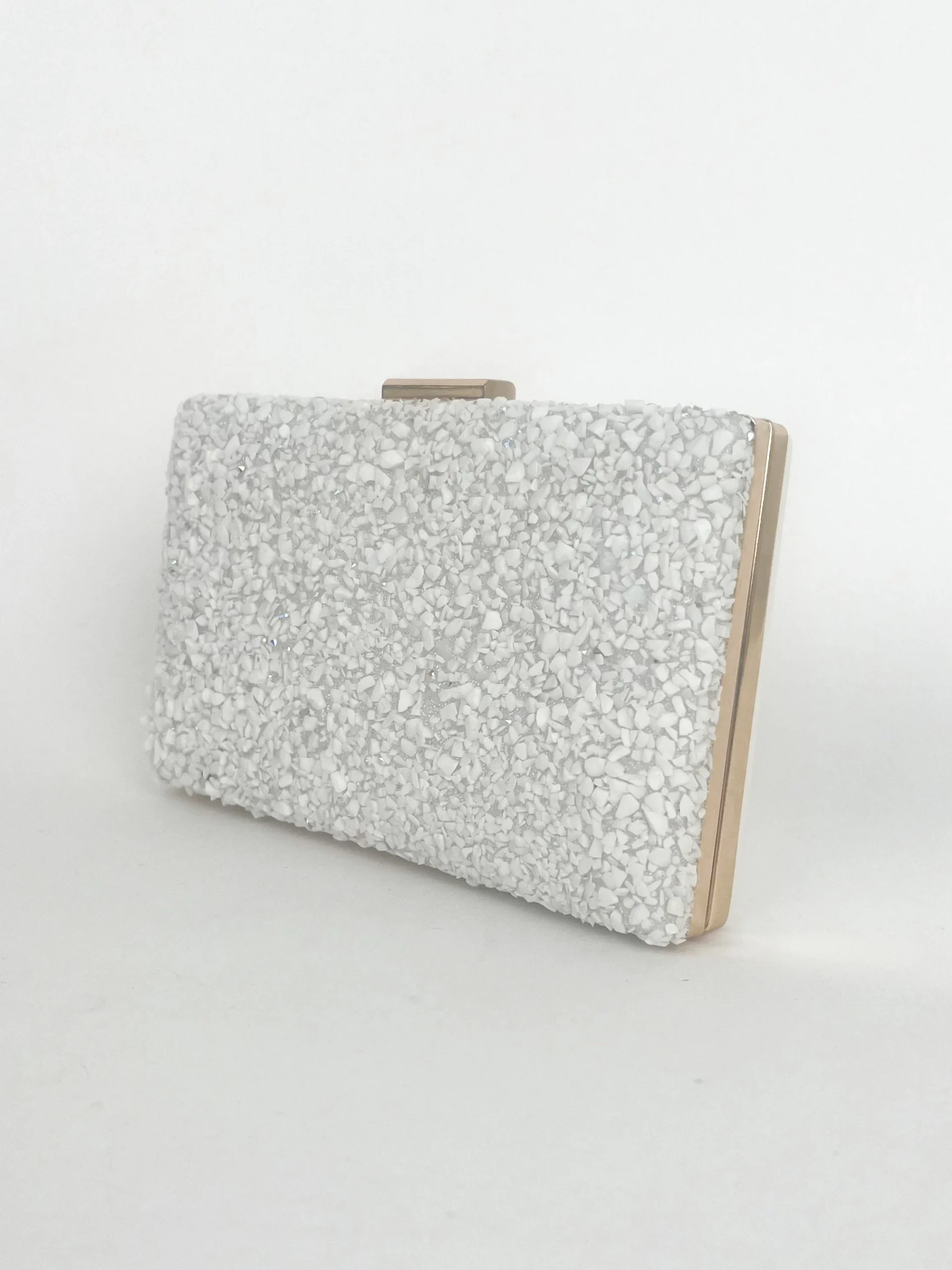 Clutch piedras blanco