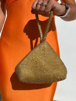 Clutch pocket brillos dorado
