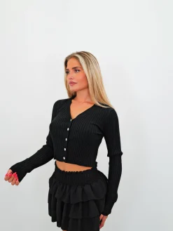 Falda mini nido volantes negro