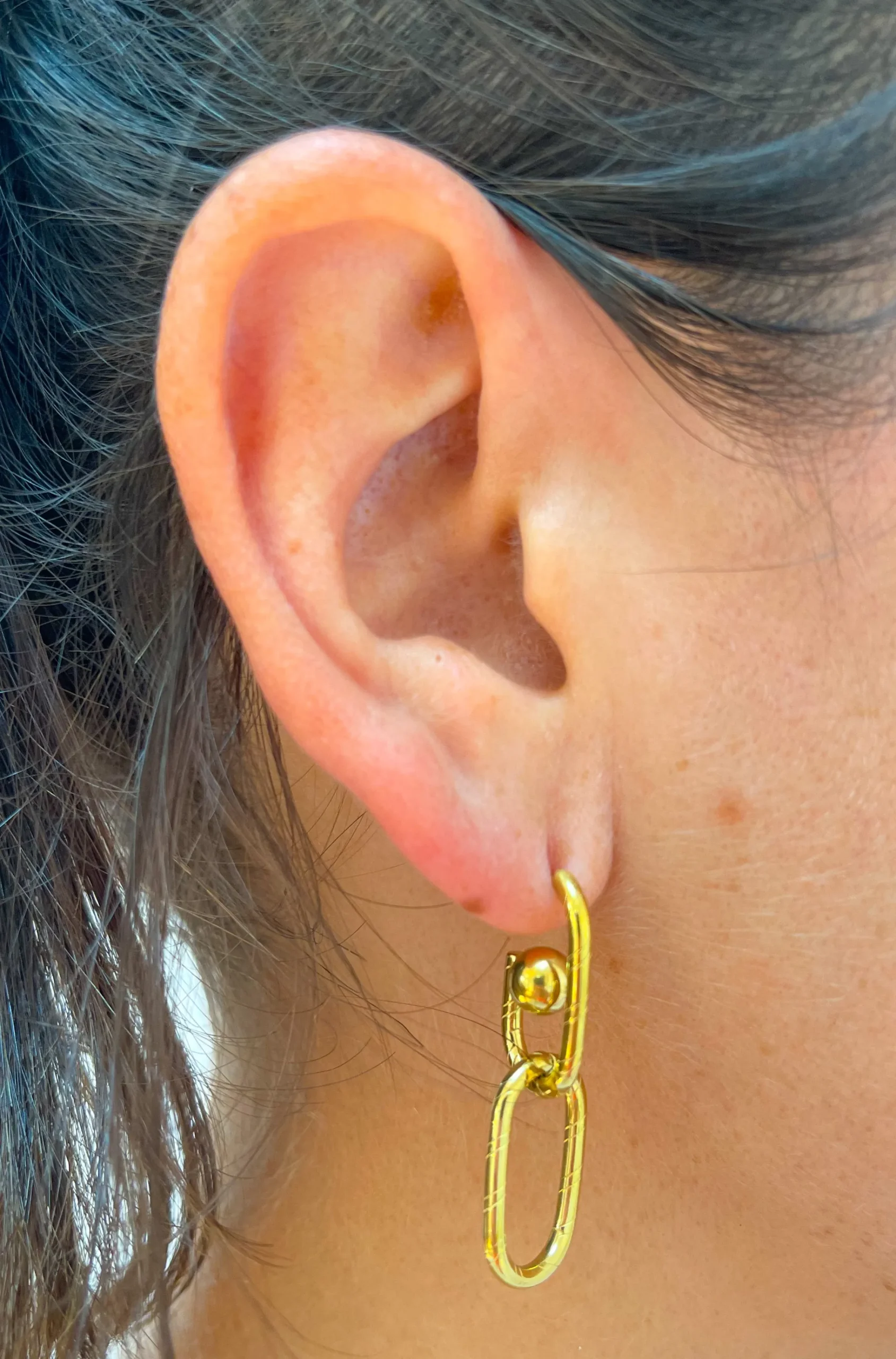 Pendientes doble eslabón dorado