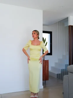 Vestido midi espalda lazo amarillo